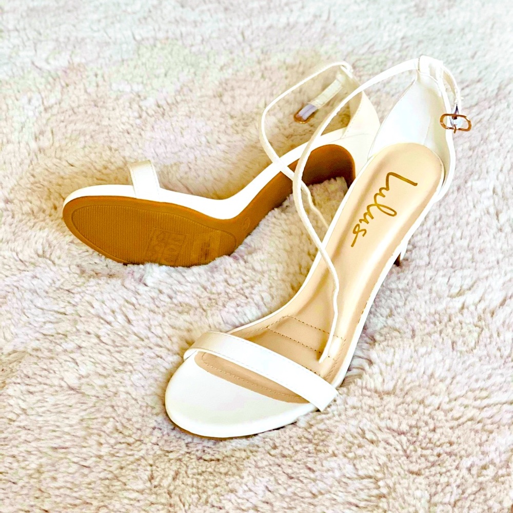 White angle strap heels